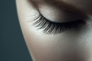 Female eye with long false eyelashes and detailed shimmering eye, a Beauty & Fashion Photo by Studio ANNA