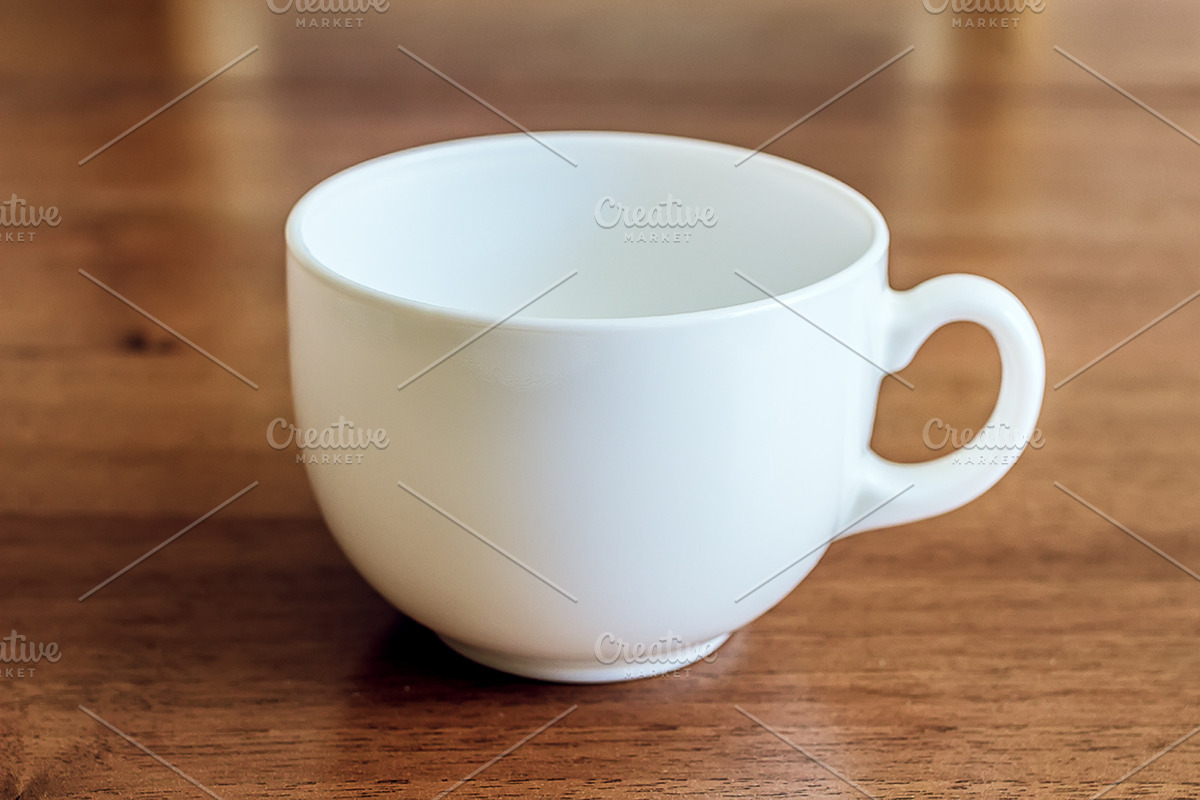 Mockup. White cup on the table., a Cups & Container Mockup by Mockups4you