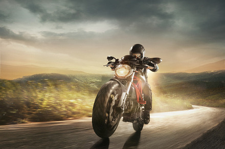 Motorcyclist in black helmet driving, a Sports & Recreation Photo by Volodymyr Melnyk