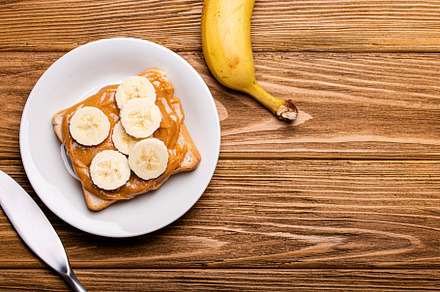 Toast with peanut butter and banana copy space, a Food & Drink Photo by its_al_dente