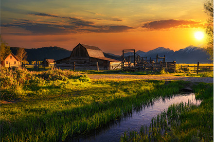 Colorful sunset over historic barn, a Nature Photo by Nick Fox