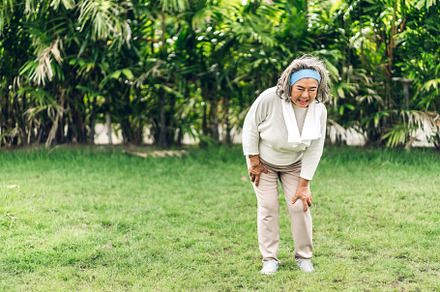 Sick unhappy senior adult elderly asian woman touching her muscl, a Person Photo by Art_Photo