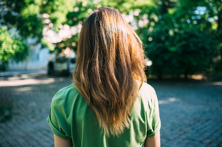 Rear view close-up of young woman with long hair, a Person Photo by progressman