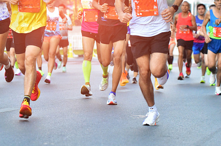 People Running On City Road.