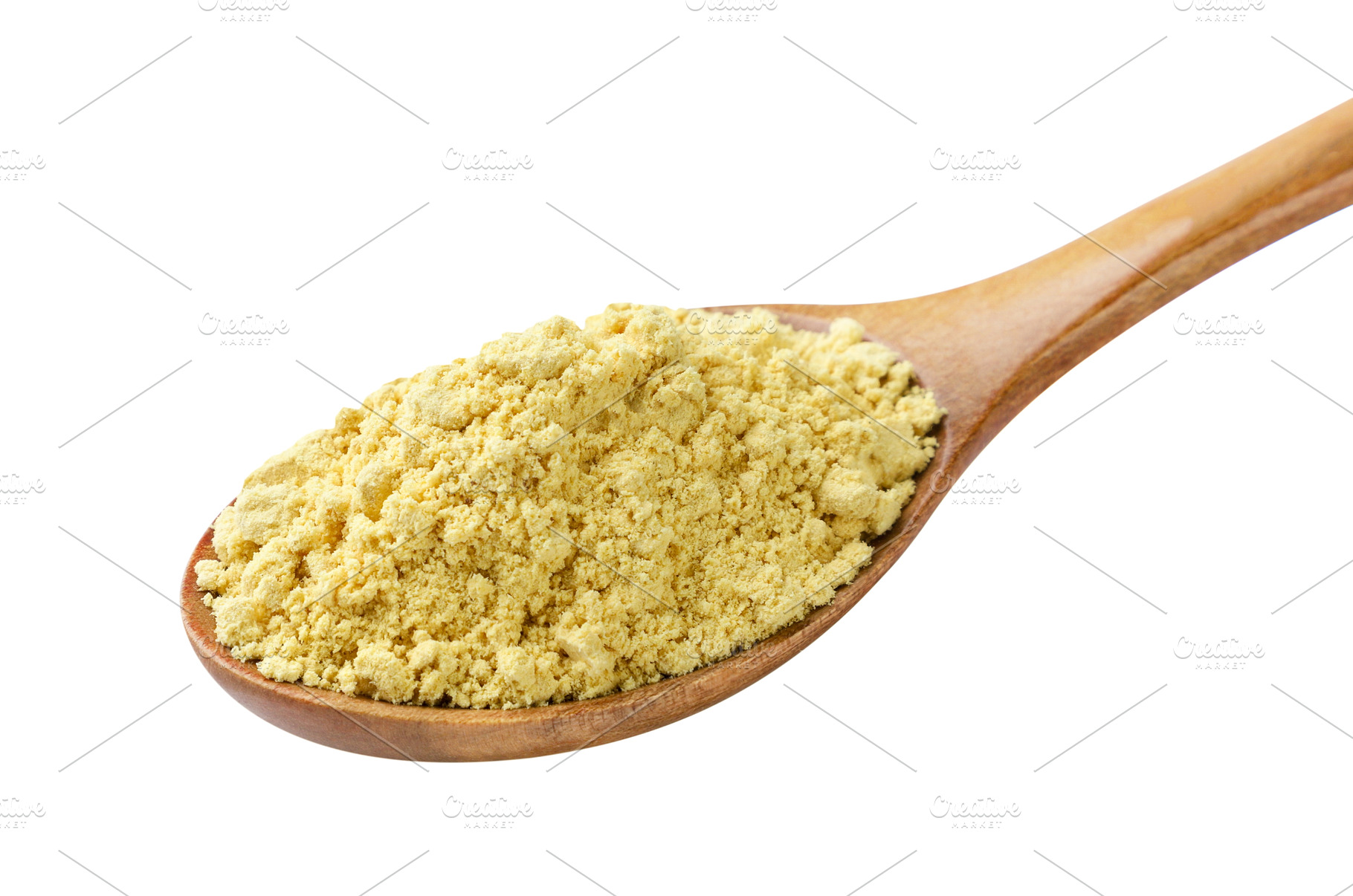 Ground mustard in a wooden spoon on, a Food & Drink Photo by innakreativ