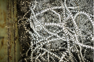 Iron filings after metal cutting., an Industrial Photo by HalfPoint