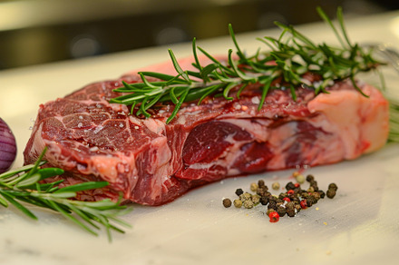 Succulent piece of meat adorned with, a Photo by Iftikhar Alam