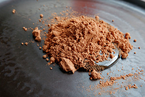 Cocoa powder with honey close up containing abstract, art, and background