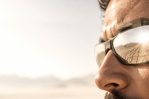 Reflection of dry desert in sunglass, a Photo by Dvoevnore photos