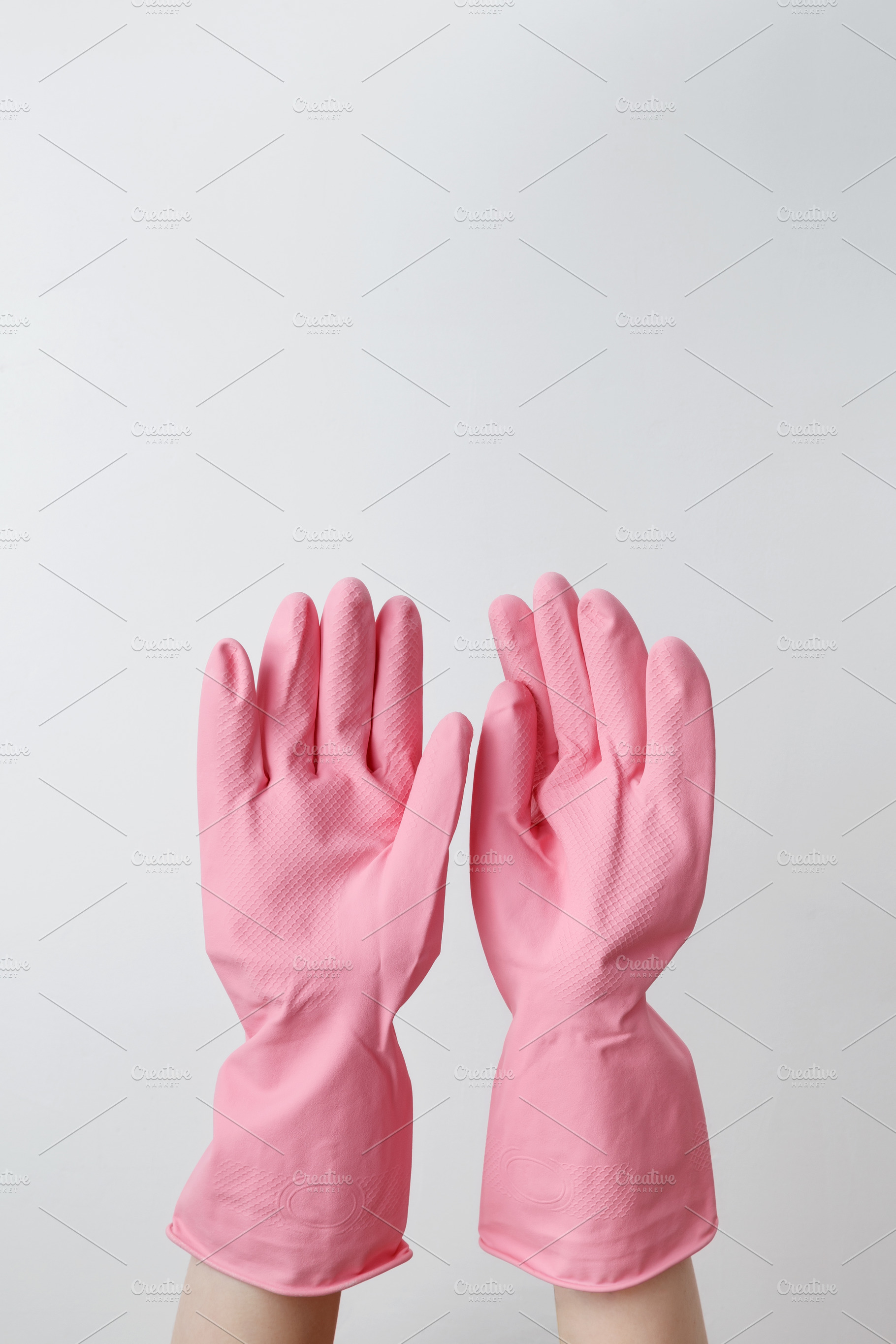 Female hands in pink rubber gloves doing house cleaning tasks. Household cleani, a Photo by matucha