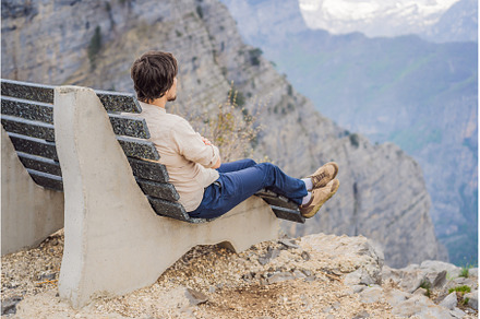 Man tourist on background of, a Nature Photo by Elizaveta Galitskaya