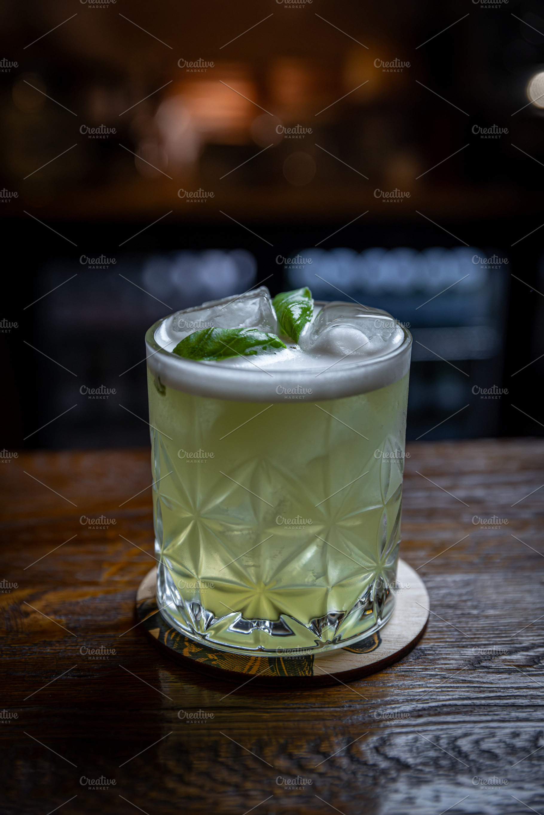 Refreshing green basil cocktail, a Photo by Grafvision photography