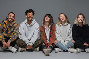 Group of friends sitting on floor, a Photo by Beautiful things