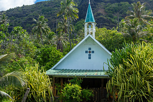 Small church in Anaho Bay, Nuku Hiva, French Polynesia, amid lus, an Architecture Photo by GoodGoods