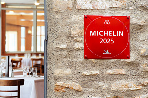 Michelin Guide sign on the wall, a Business Photo by BOOCYS