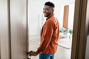 Joyful African American Male Entering His New Apartment Opening Door, a Photo by Prostock-Studio (Thumbnail 1 of 2)