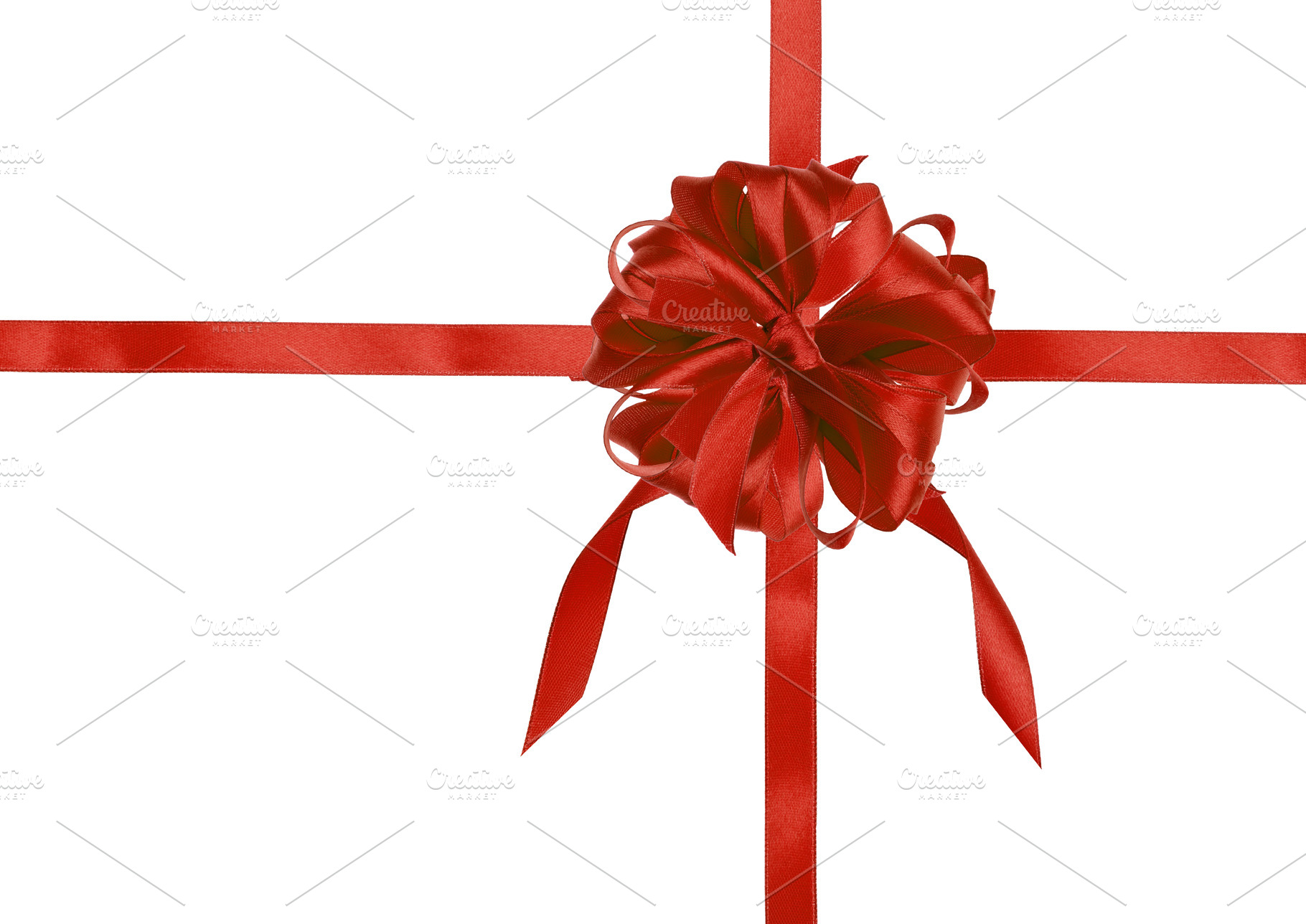 Red silk ribbon bow and cross ribbons on isolated background, gi, a Holiday Photo by ndanko
