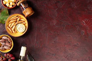 Charcuterie Snacks and White Wine on Dark Rustic Background, a Food & Drink Photo by Natalia Klenova's Shop