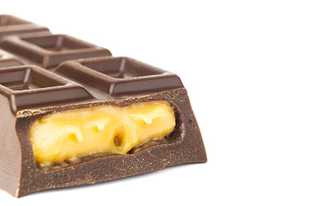 Chocolate bar isolated on white back, a Food & Drink Photo by AlexBush