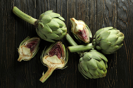 Concept of healthy food with artichoke on wooden background, a Food & Drink Photo by AtlasStudio