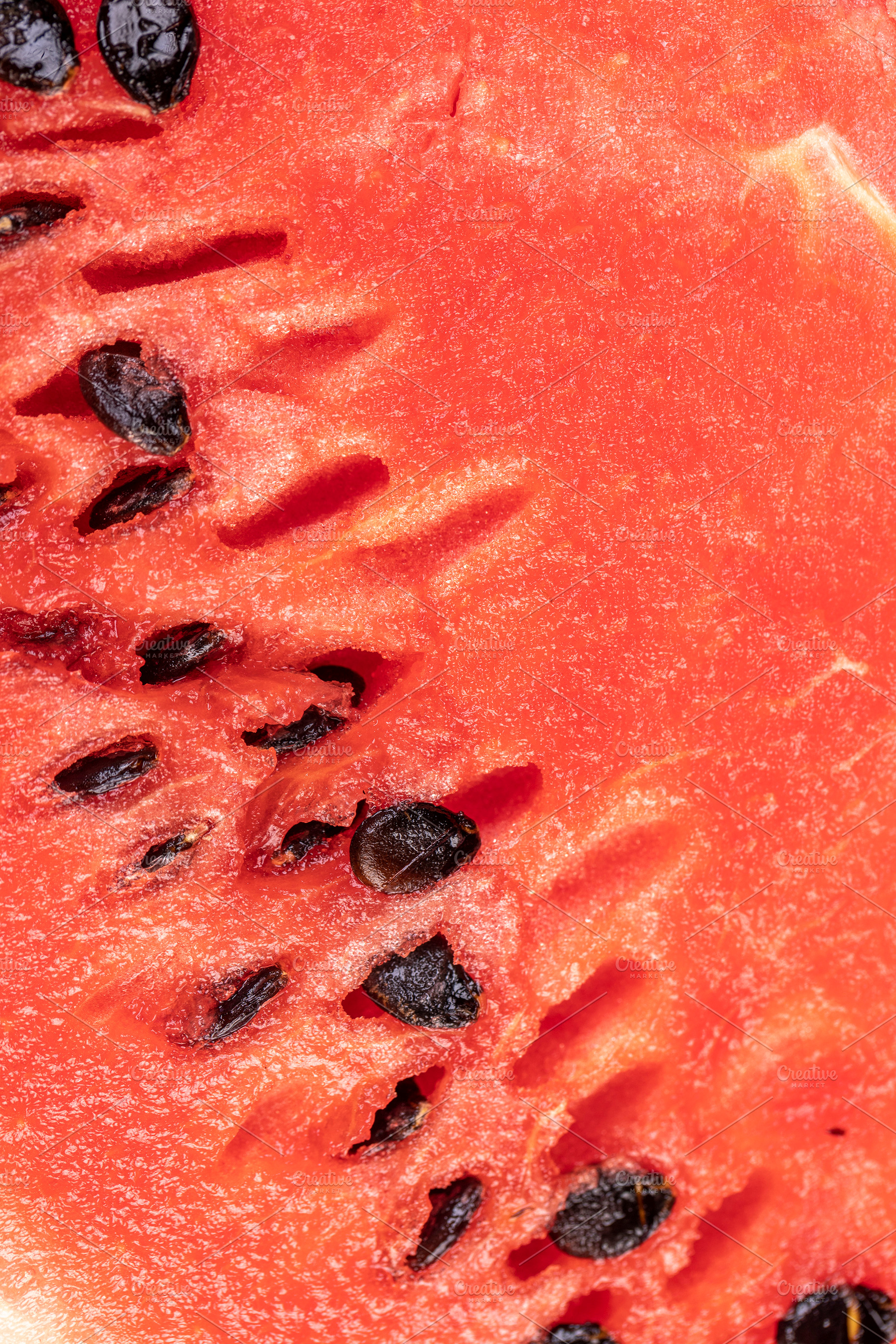 part of a sliced juicy watermelon with black seeds, a Photo by rsoollAI