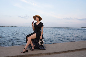 Woman in hat and dress poses, a Person Photo by Elena Vagengeim