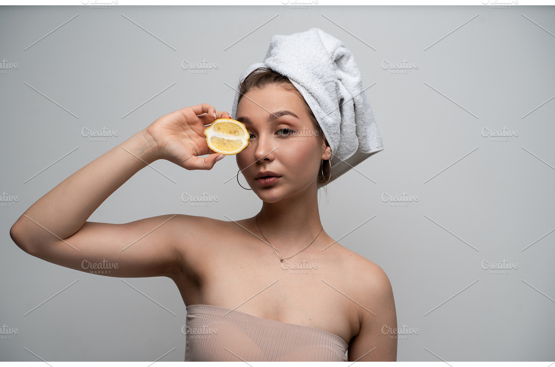 Woman with a towel on her head, a Health & Medical Photo by volodymyrshtun13795