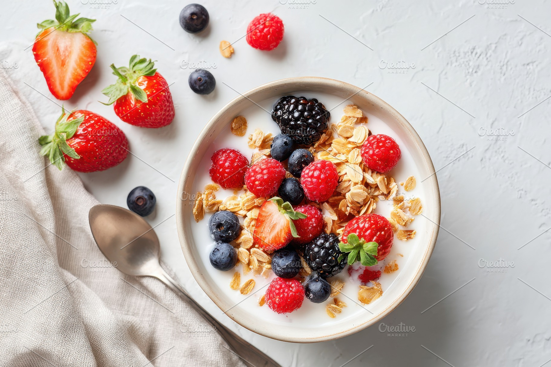 Healthy yogurt bowl with berries and granola, a Food & Drink Photo by AlyaAnd