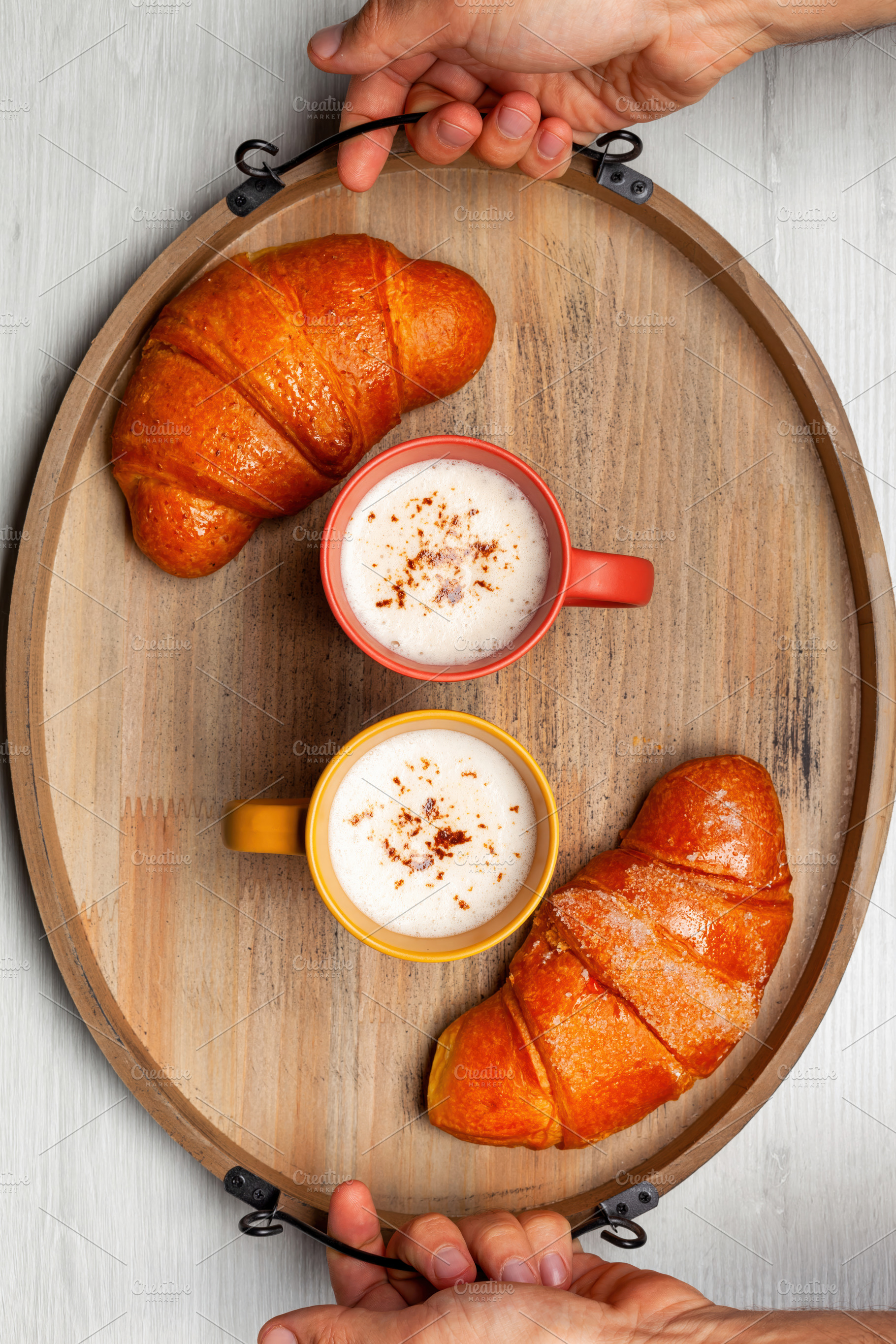Waiters carrying breakfast tray with cappuccino and croissants, a Food & Drink Photo by Antonio Gravante Market
