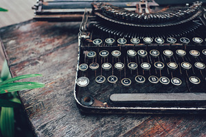 Old typewriter containing typewriter, vintage, and retro