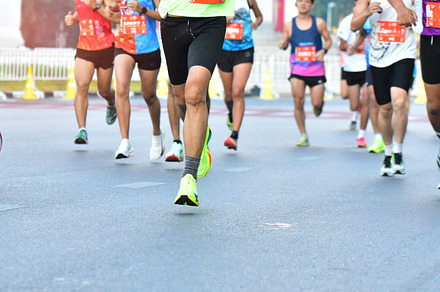 People Running On City Road.