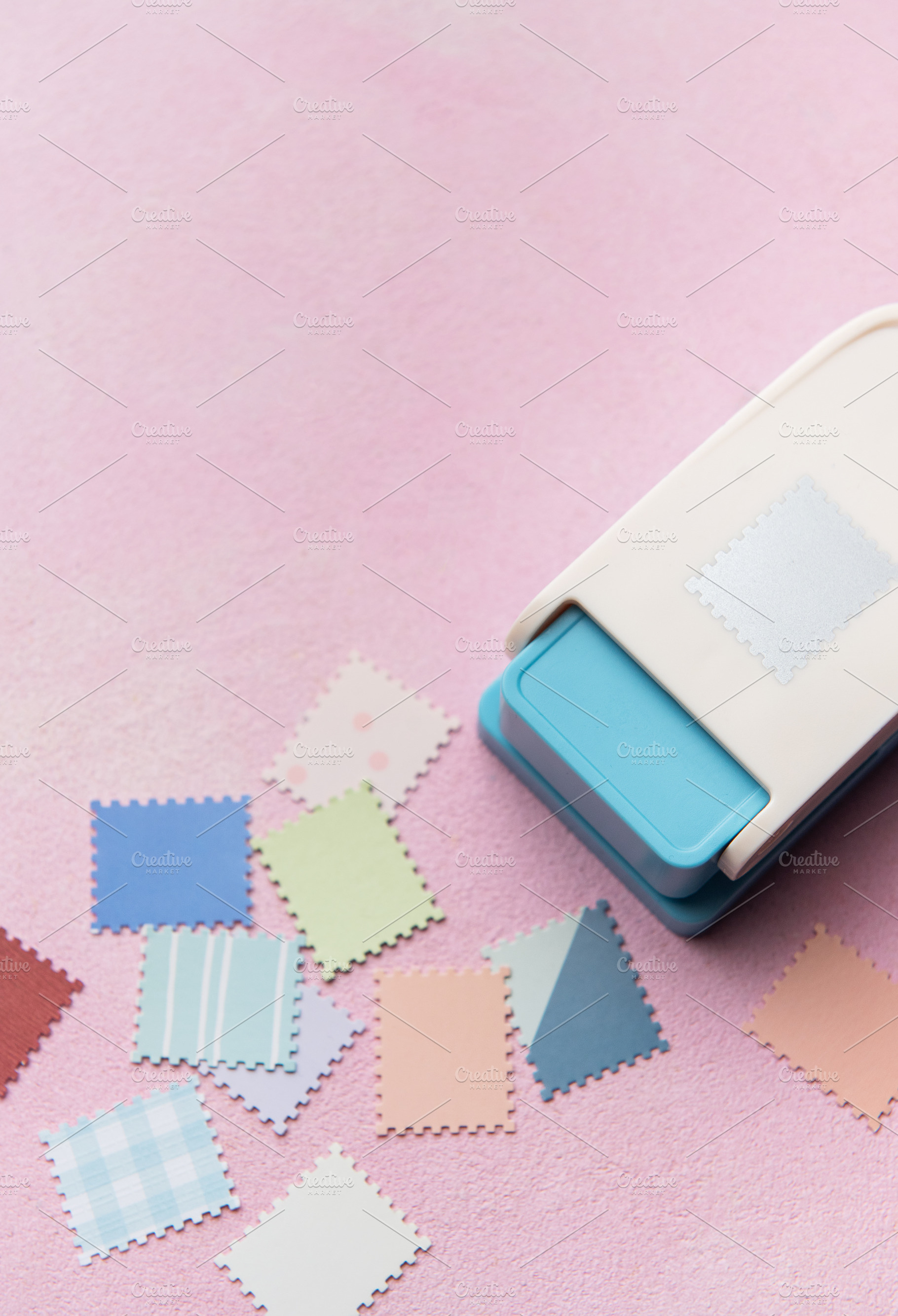 Punching decorative paper shapes for creative scrapbooking craft, an Arts & Entertainment Photo by Olena Rudo