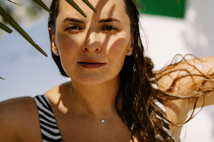 woman on the beach, a Person Photo by EVA.studio