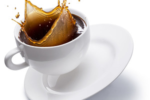 Coffee drink splashing from cup, a Food & Drink Photo by Volff