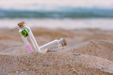 Message or letter in bottle on the tropical beach, a Nature Photo by Casanowe-studio