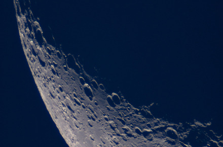 Rugged crescent Moon limb with crate