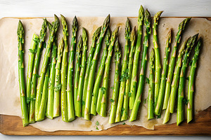 Baked asparagus with spices on wooden background, a Food & Drink Photo by AlyaAnd