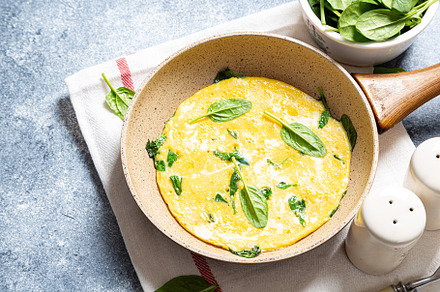 homemade egg omelet with spinach, a Food & Drink Photo by Ivanna