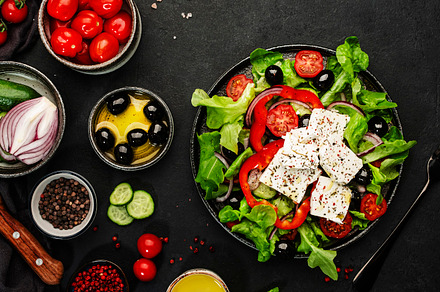 Greek salad with feta cheese, olives, cherry tomato, paprika, cu, a Food & Drink Photo by 5PH