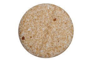 Round pressed tablet on isolated background, a Health & Medical Photo by ndanko