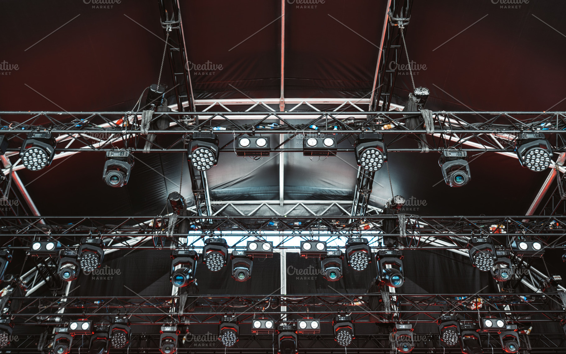 Dense concert lighting setup, a Technology Photo by SkyNext