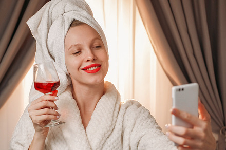 Online drink video call woman wine glass phone, a Person Photo by Photo Drive Studio