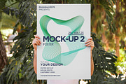 Man Holding Poster 2 Mock-up, a Print Template by Branda Keeps (Thumbnail 10 of 16)