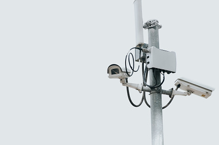 CCTV camera electric pole on isolated white sky with copy space., a Technology Photo by Ministocker