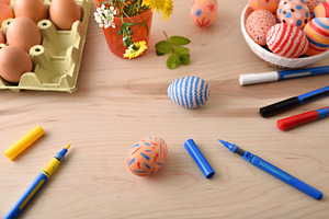 DIY Easter Egg Painting on Wooden Table, a Holiday Photo by Davizro's Market