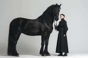 Dark horse and rider, a Photo by Beautiful things