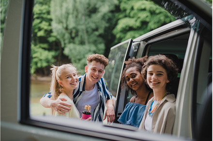 Multiracial young friends travelling, a Person Photo by HalfPoint