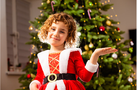 Adorable girl in Christmas dress, a Holiday Photo by oksix