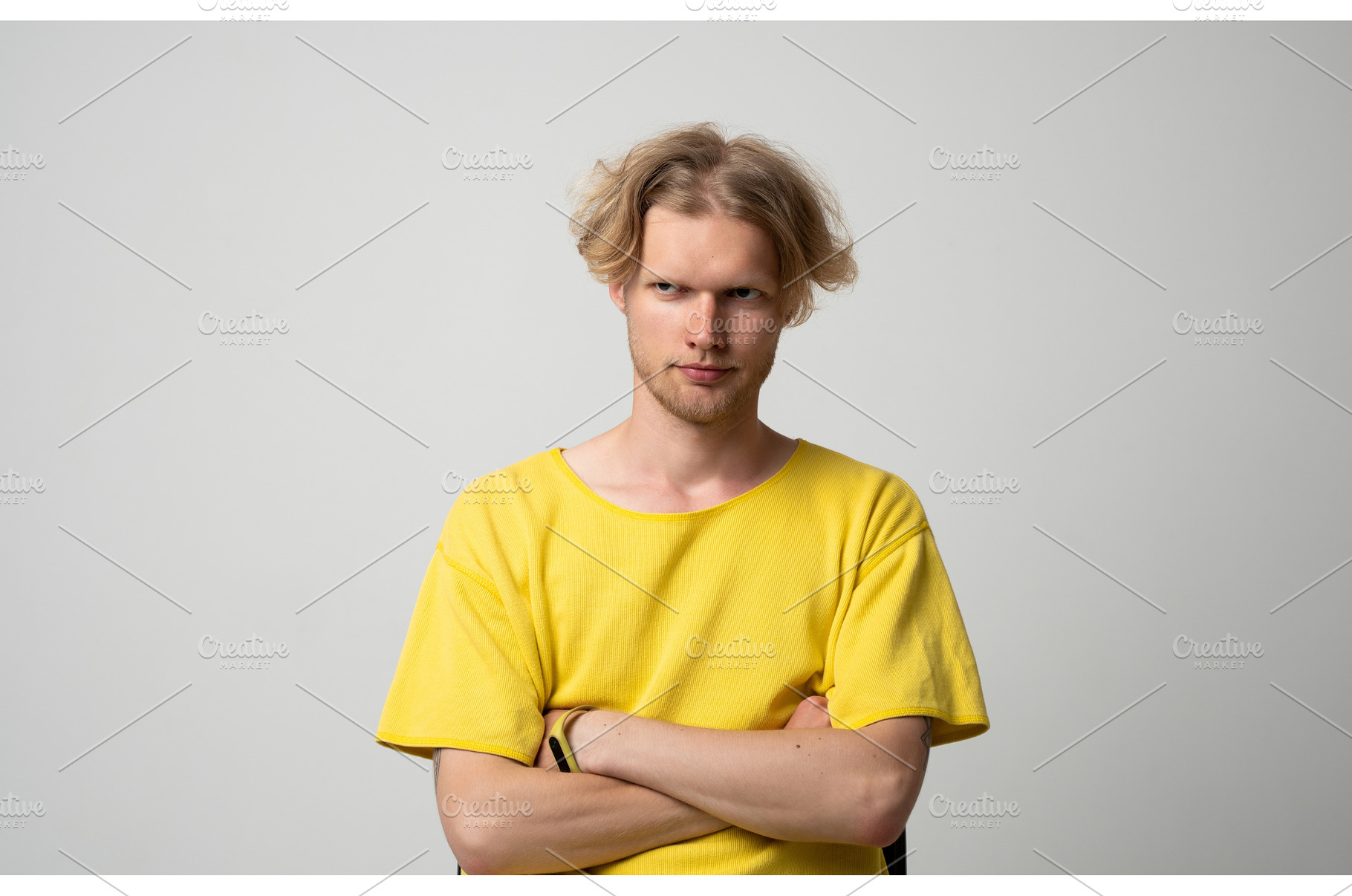 Young man showing distrustful and, a Person Photo by volodymyrshtun13795