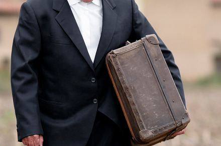 emigrant with suitcase and vintage suit leaving his village to l